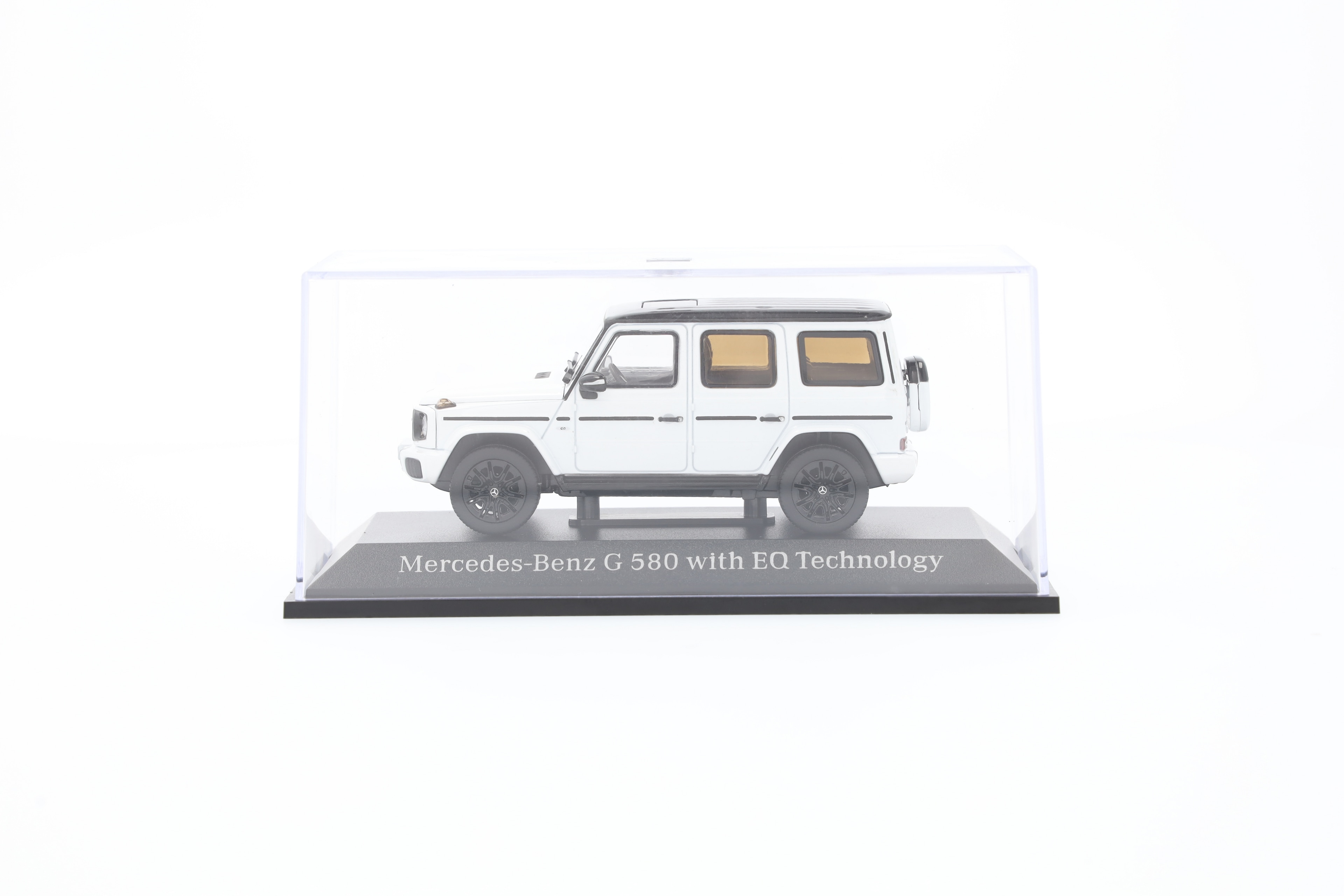 G 580 med EQ-teknik, Terrängbil, AMG Line, N465 - MANUFAKTUR opalitvit bright, Norev, 1:43